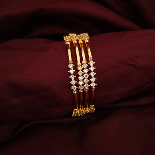 A Set of 4 Classic AD Stone Bangles