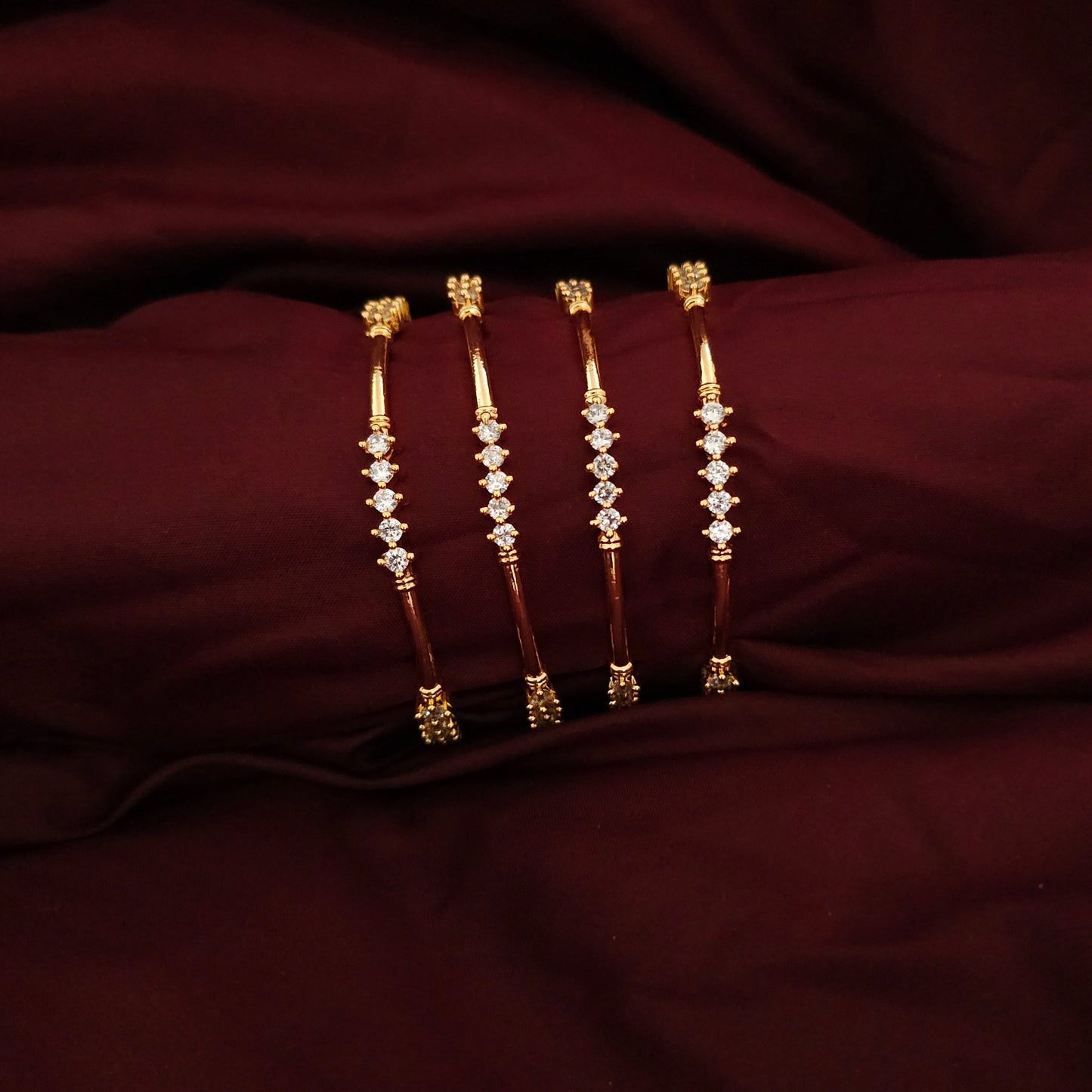 A Set of 4 Classic AD Stone Bangles