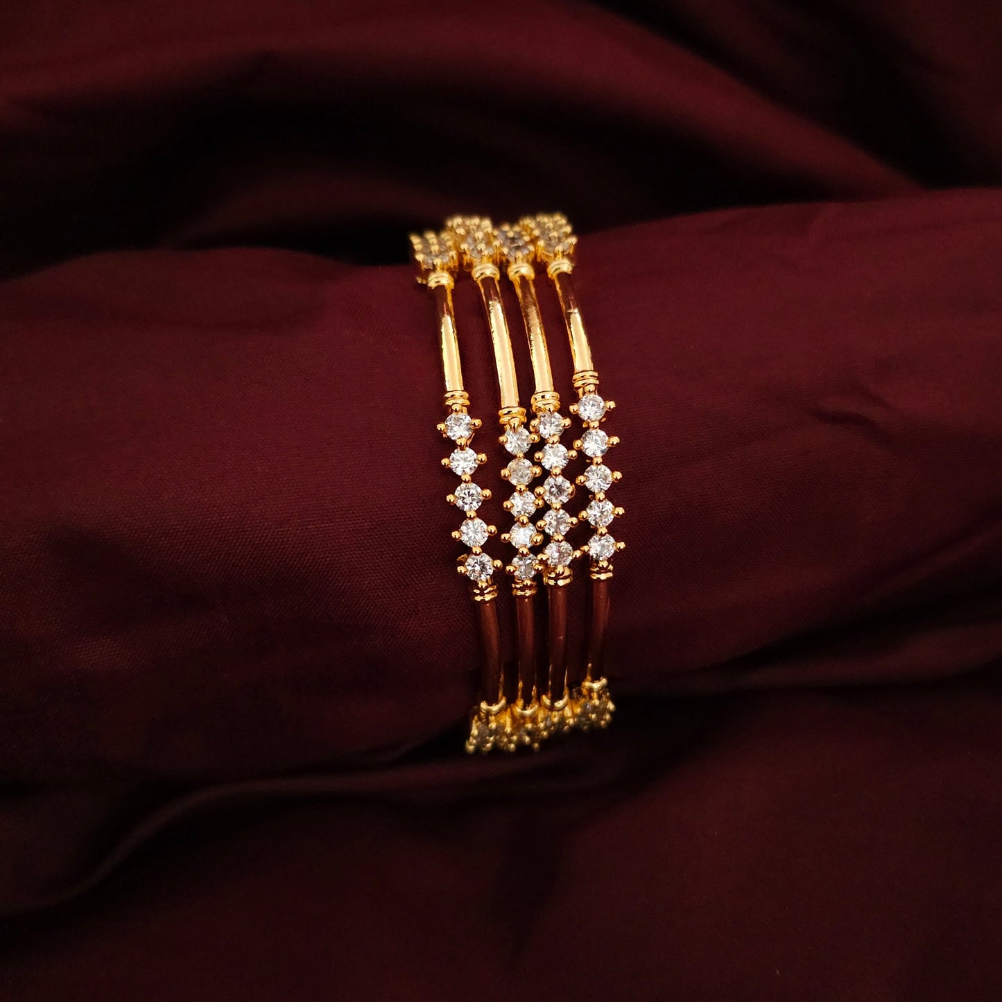 A Set of 4 Classic AD Stone Bangles