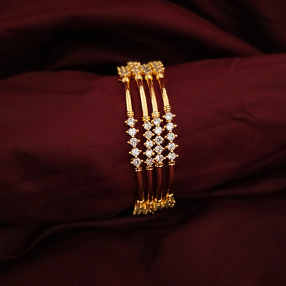 A Set of 4 Classic AD Stone Bangles