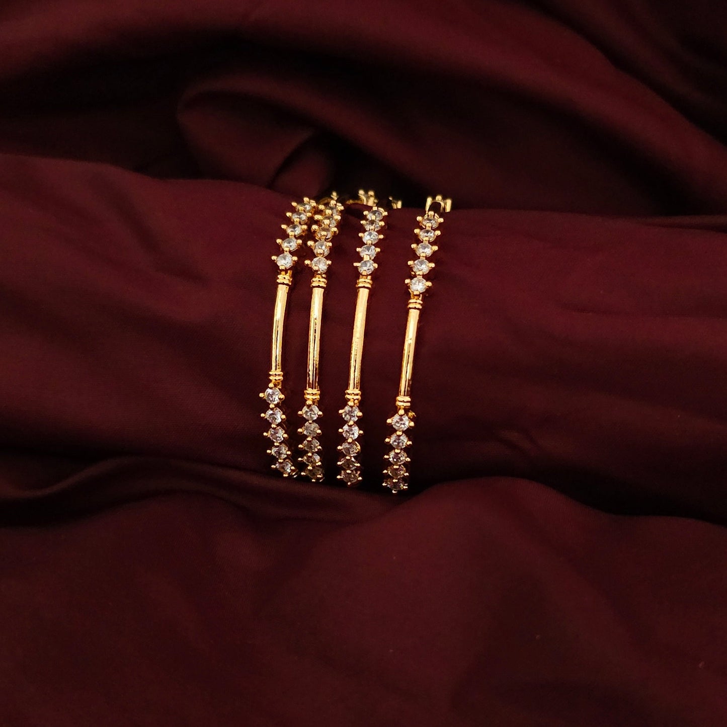 A Set of 4 Classic AD Stone Bangles