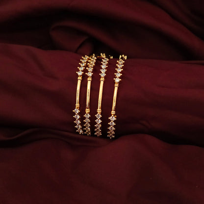 A Set of 4 Classic AD Stone Bangles