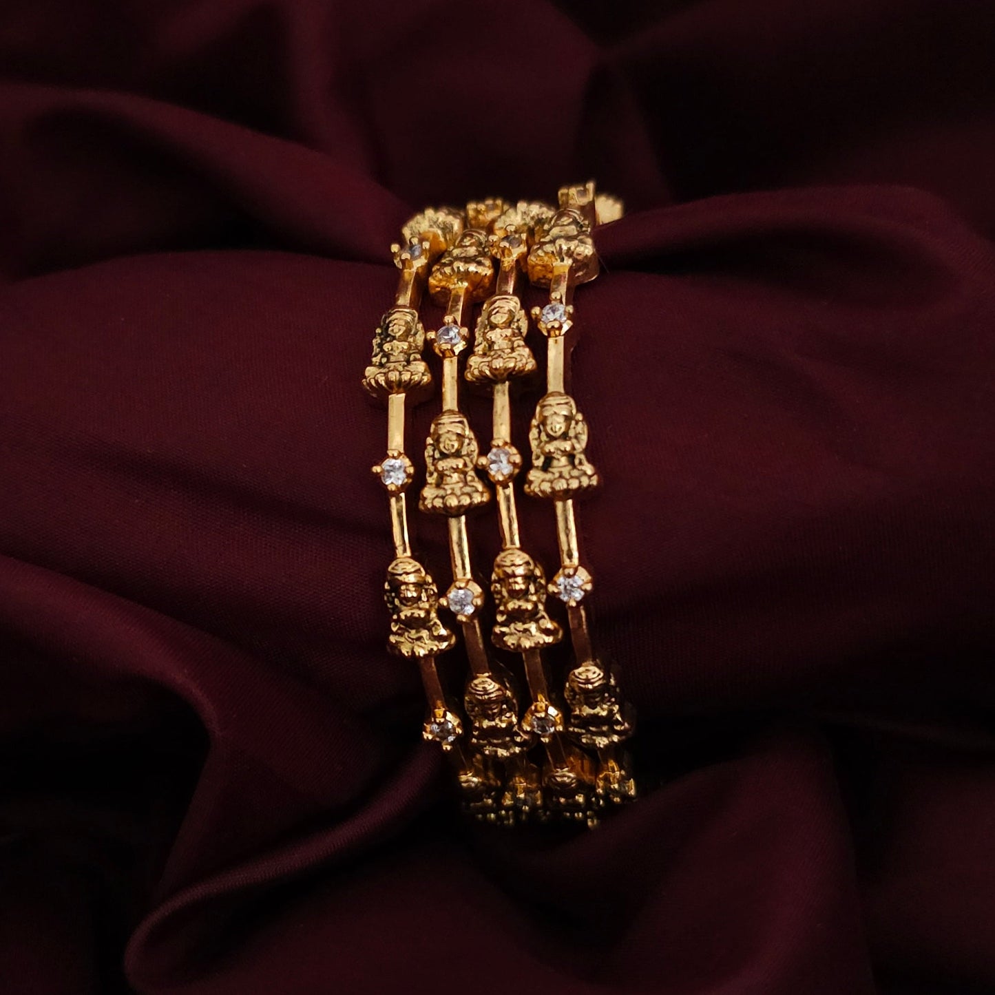 A set of 4 Traditional Lakshmi motif Bangle with AD stones